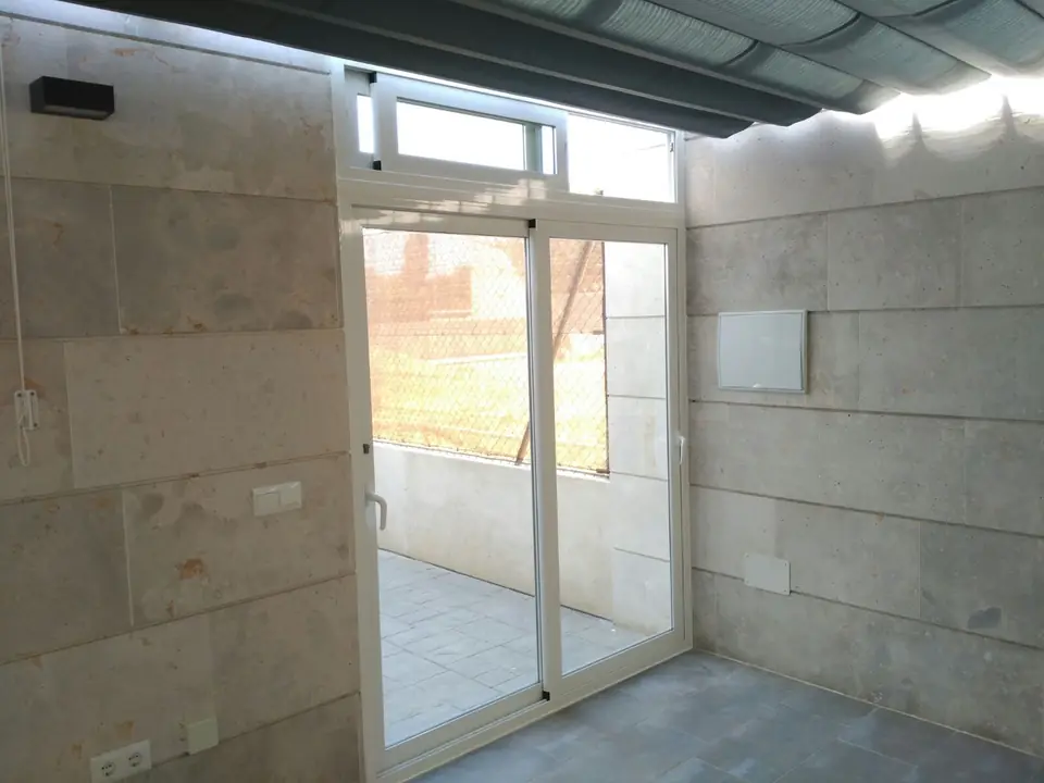 Cerramiento de aluminio en un patio de San Agustín de Guadalix