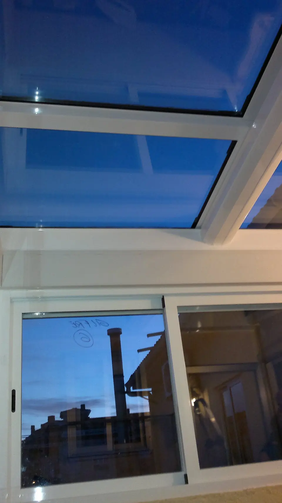 Techo acristalado con ventana corredera
